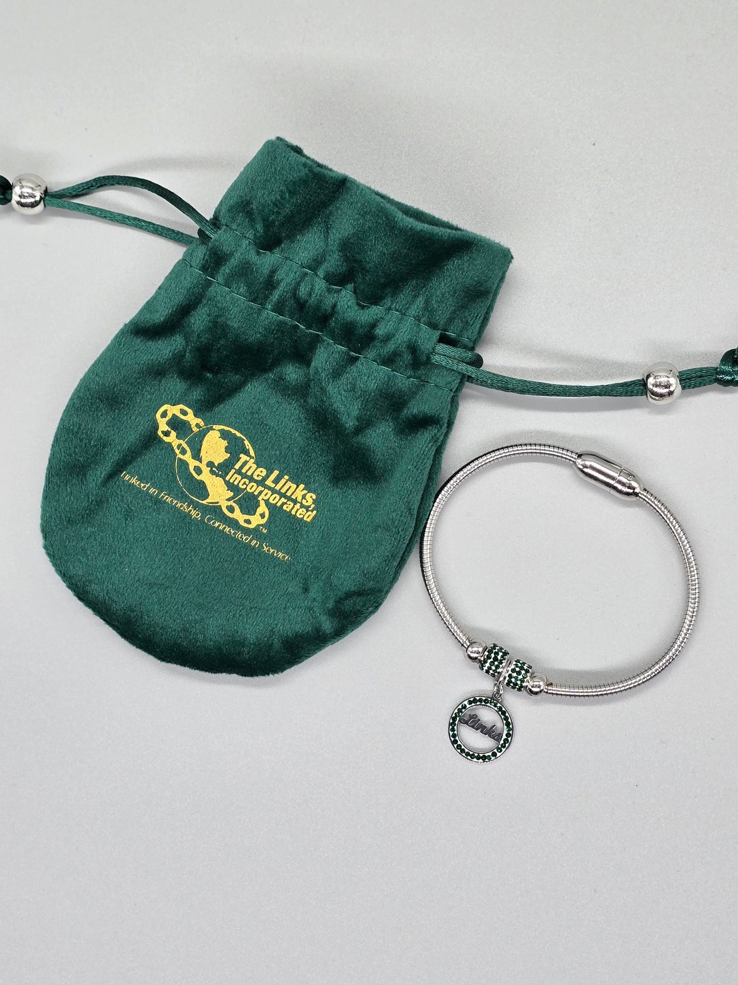 Silver Emerald Accented Charm Bracelet